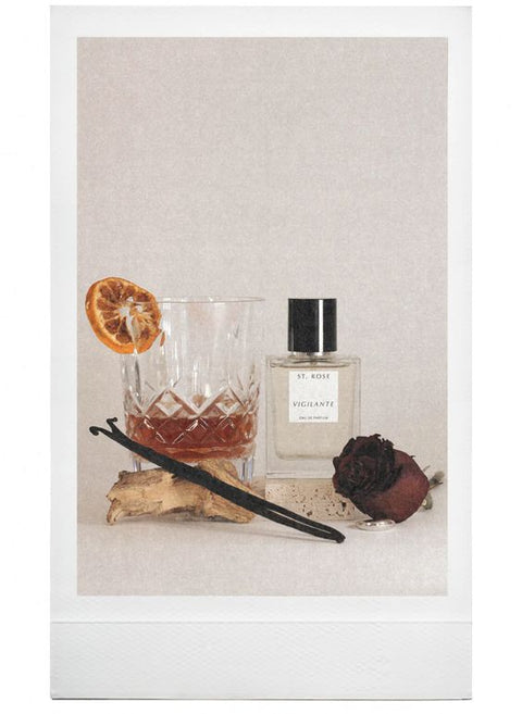 Bottle of Vigilante perfume with its scent inspirations