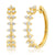 Yellow gold hoop earrings with diamonds in spiked design surrounding
