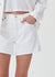 Close up of the white denim short on a model