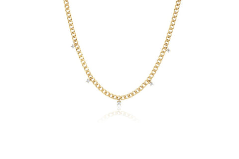 Image of the necklace in yellow gold showing the 5 diamond detail.