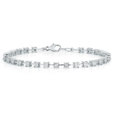 White gold tennis bracelet with diamonds in intervals