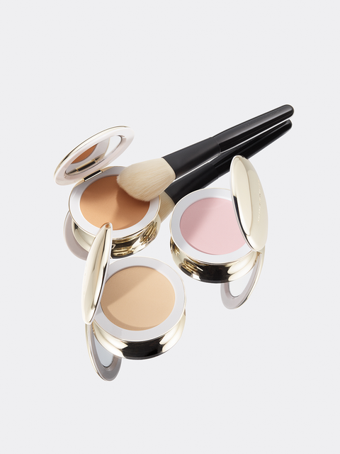 Image of multiple different shades of the pressed skincare powder together.  