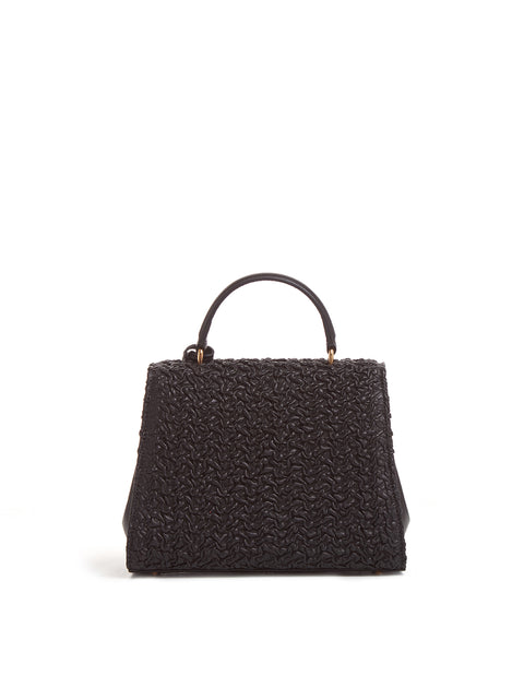 Back of the black Madeline 21 bag
