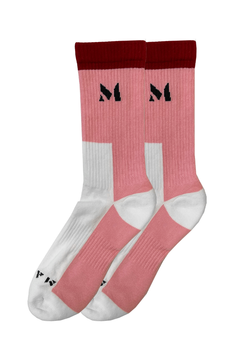 Close-up view of the pink, red, and white socks